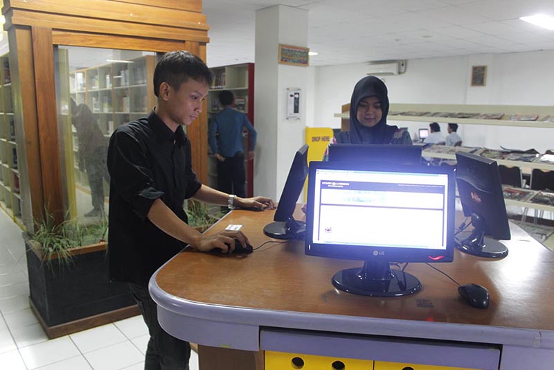 Perpustakaan Amikom dengan Teknologi